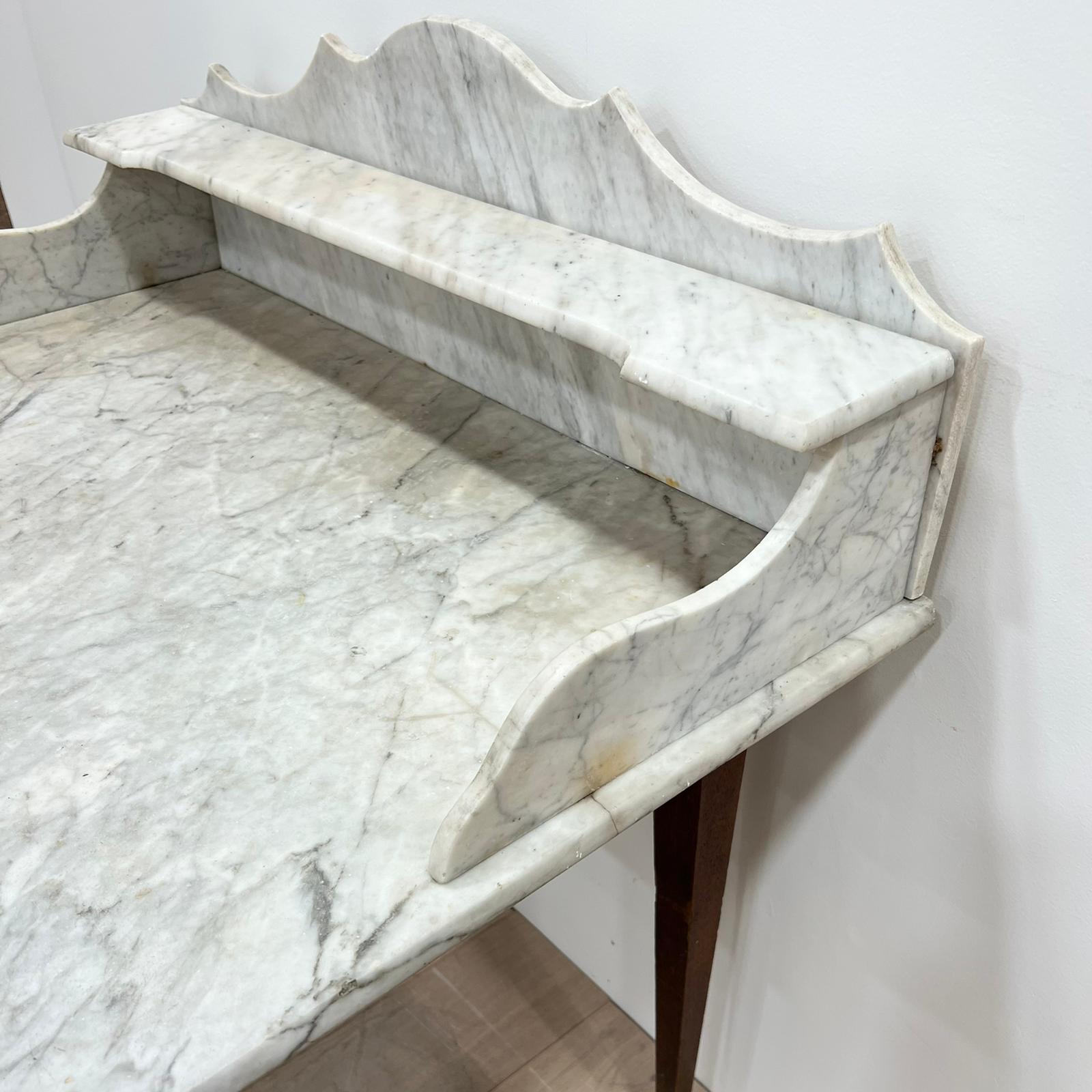Vintage marble and wood toilet table