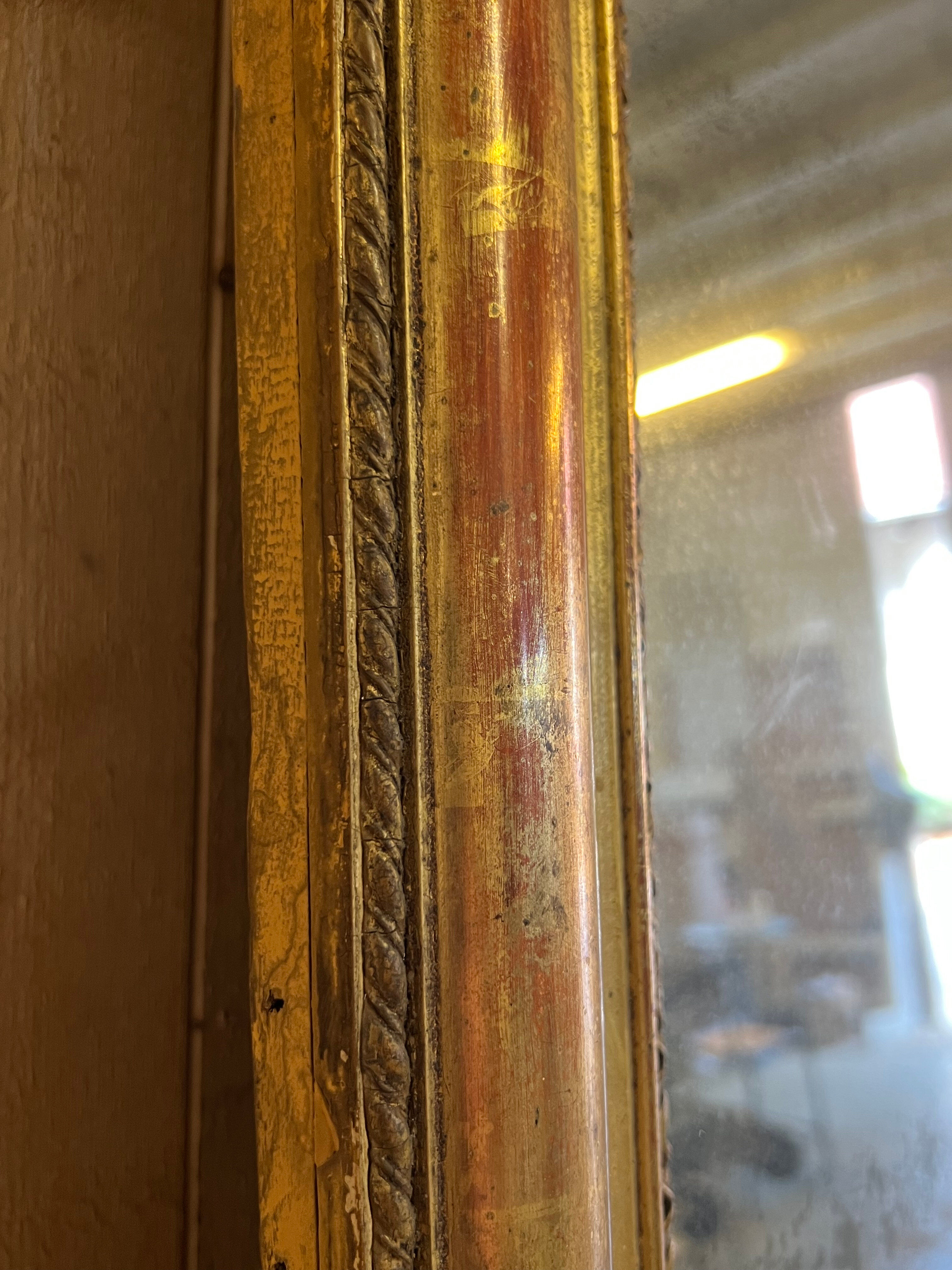 Louis Philippe mirror with a mercury pediment