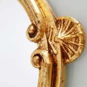 Miroir en bois doré à la feuille d'or