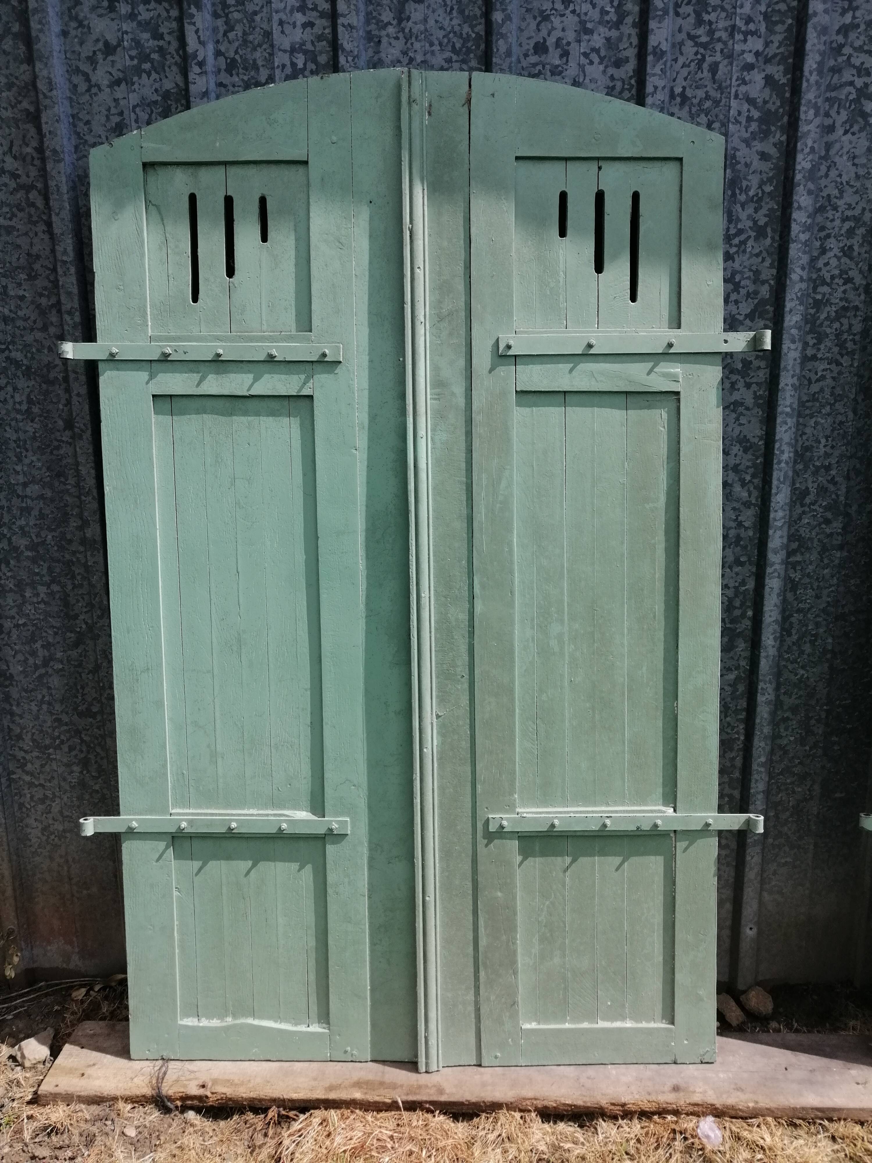 Pairs of old painted oak shutters