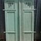 Pairs of old painted oak shutters