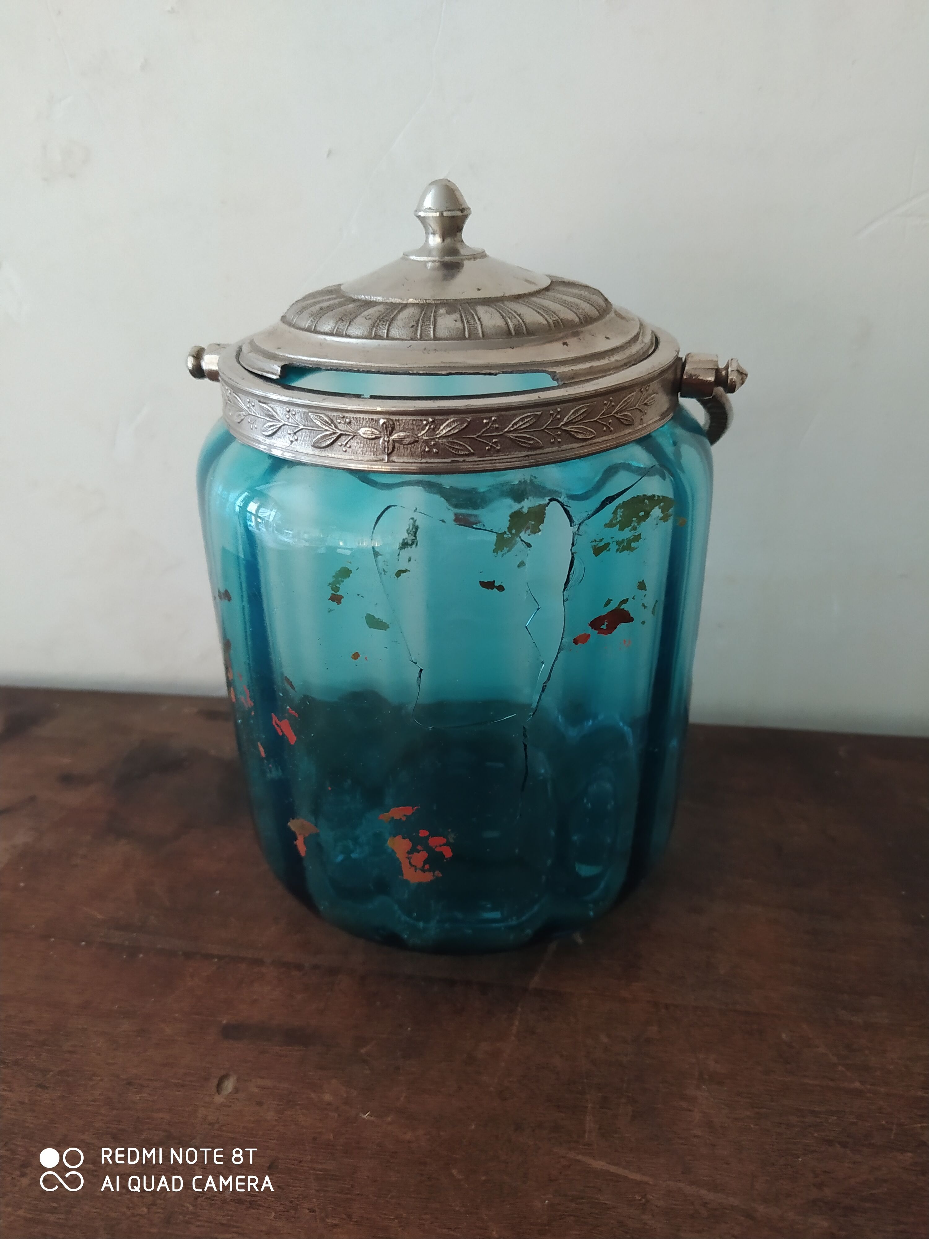 Set including a bottle and a turquoise blue glass jar