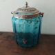 Set including a bottle and a turquoise blue glass jar