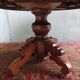 English oval table with 19th century mahogany extensions