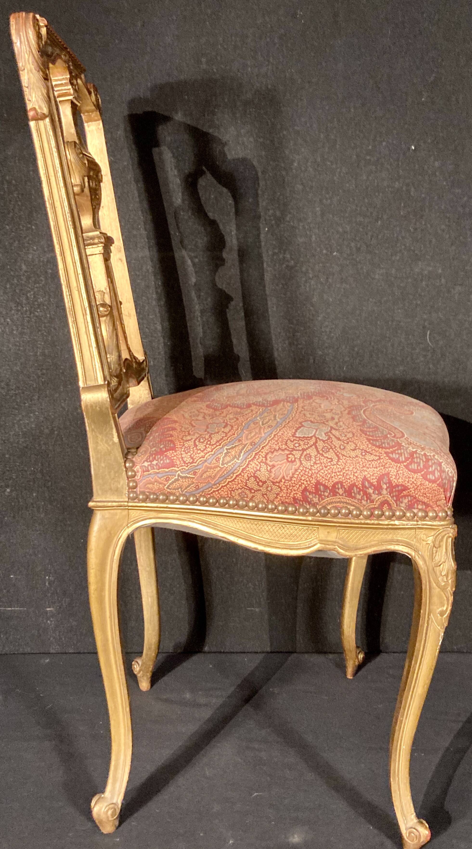 Pair of gilded wooden chairs