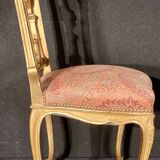 Pair of gilded wooden chairs