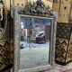 Napoleon iii pediment mirror in gilded stucco and green patina