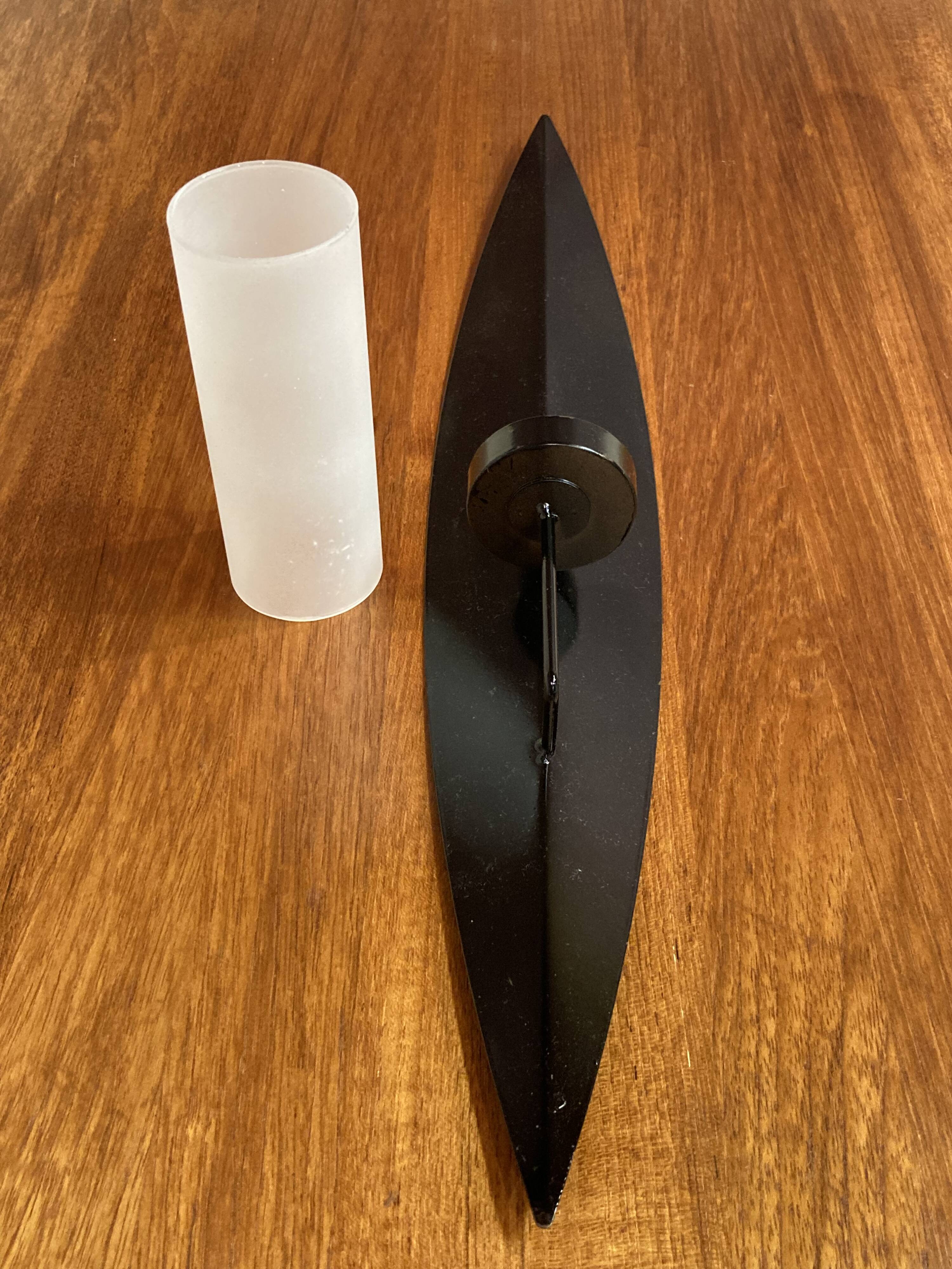 Pair of Scandinavian design candle holders in glass and metal.