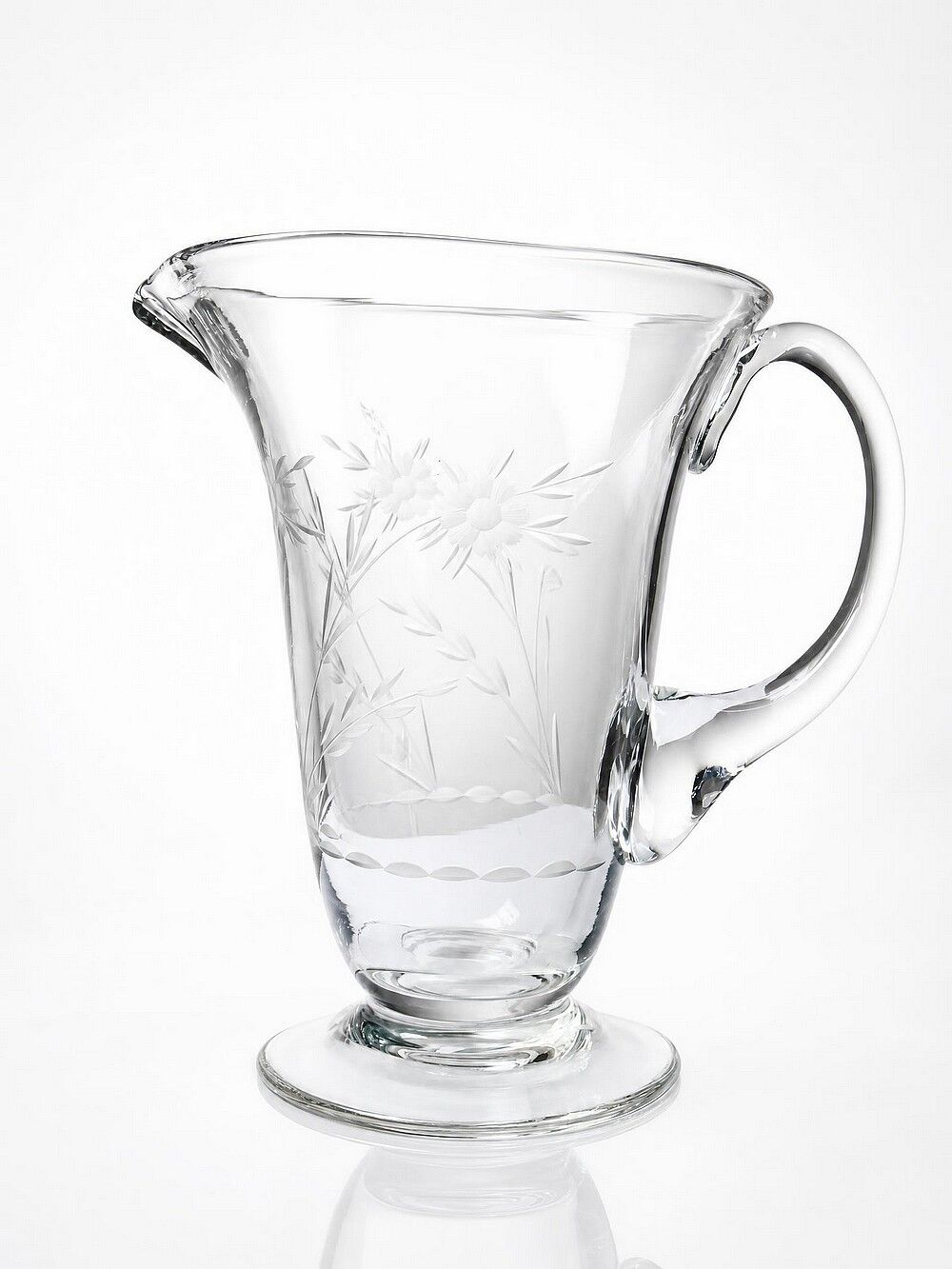 Antique glass pitcher with wheel engraving and floral decoration, Bohemia, early 20th century.
