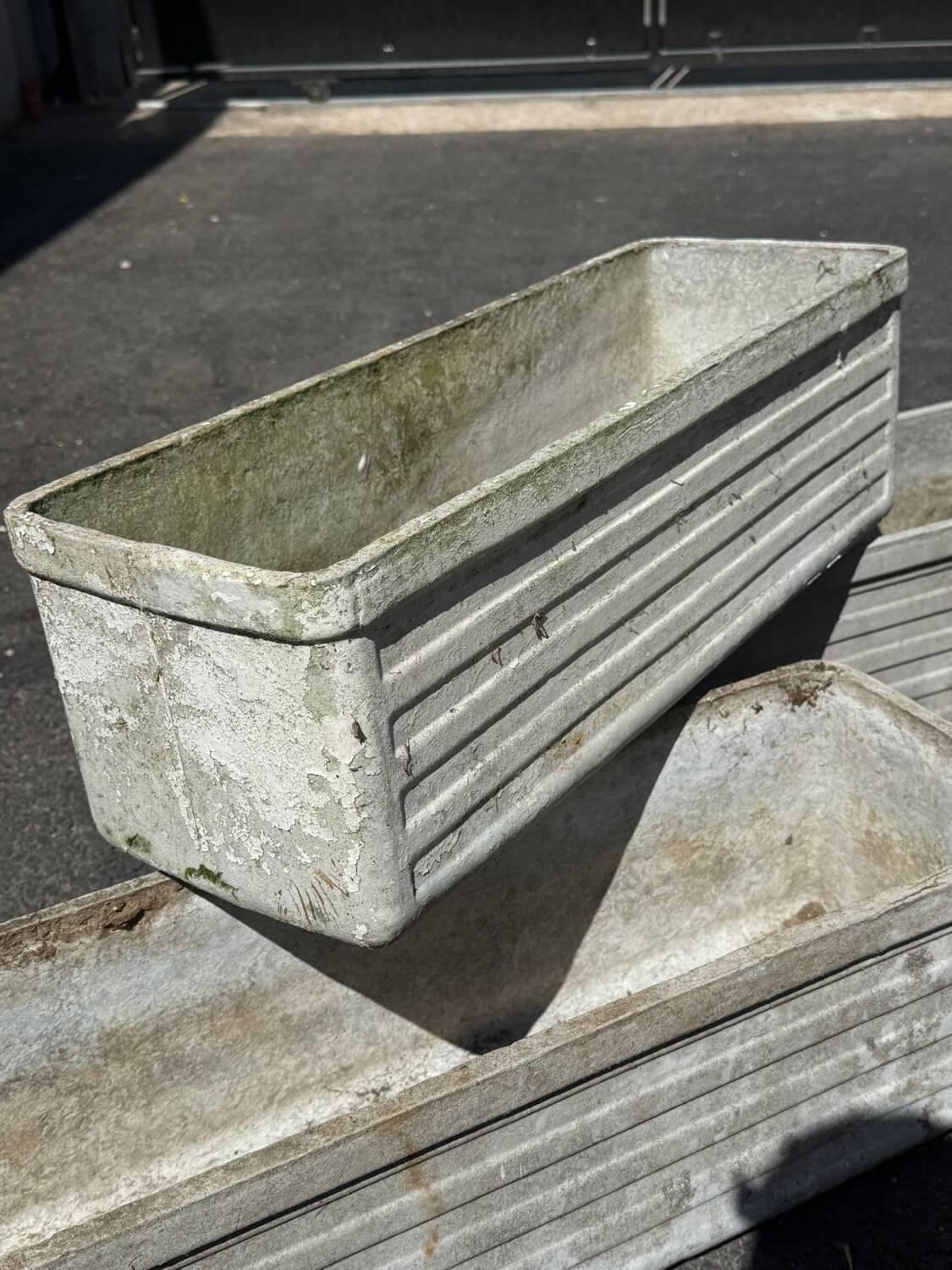Set of 4 fibreglass planters by Willy Guhl