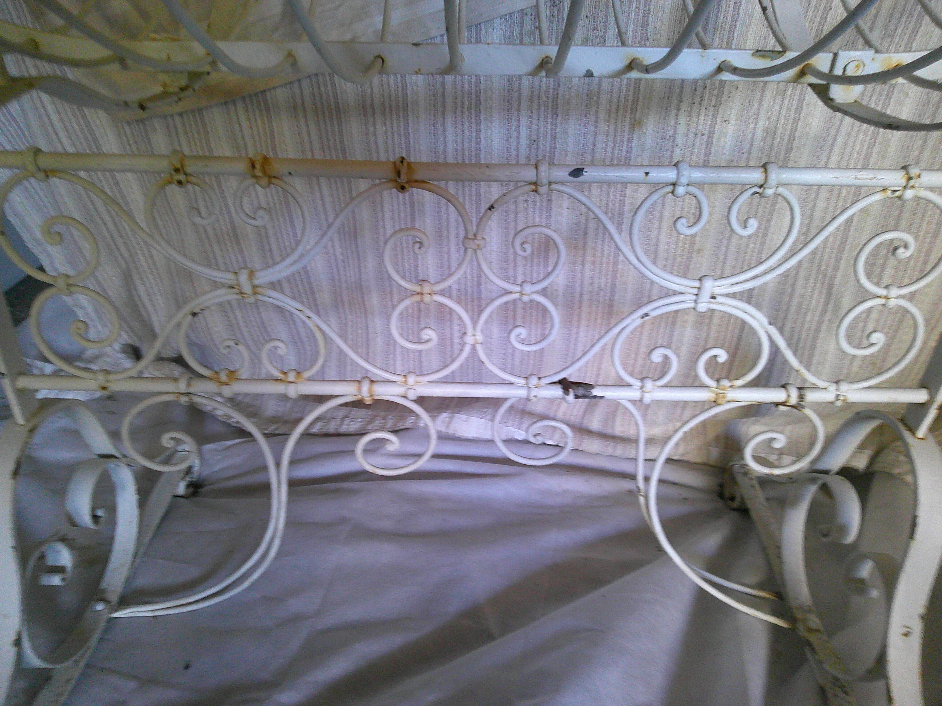 Wrought iron rocking cradle