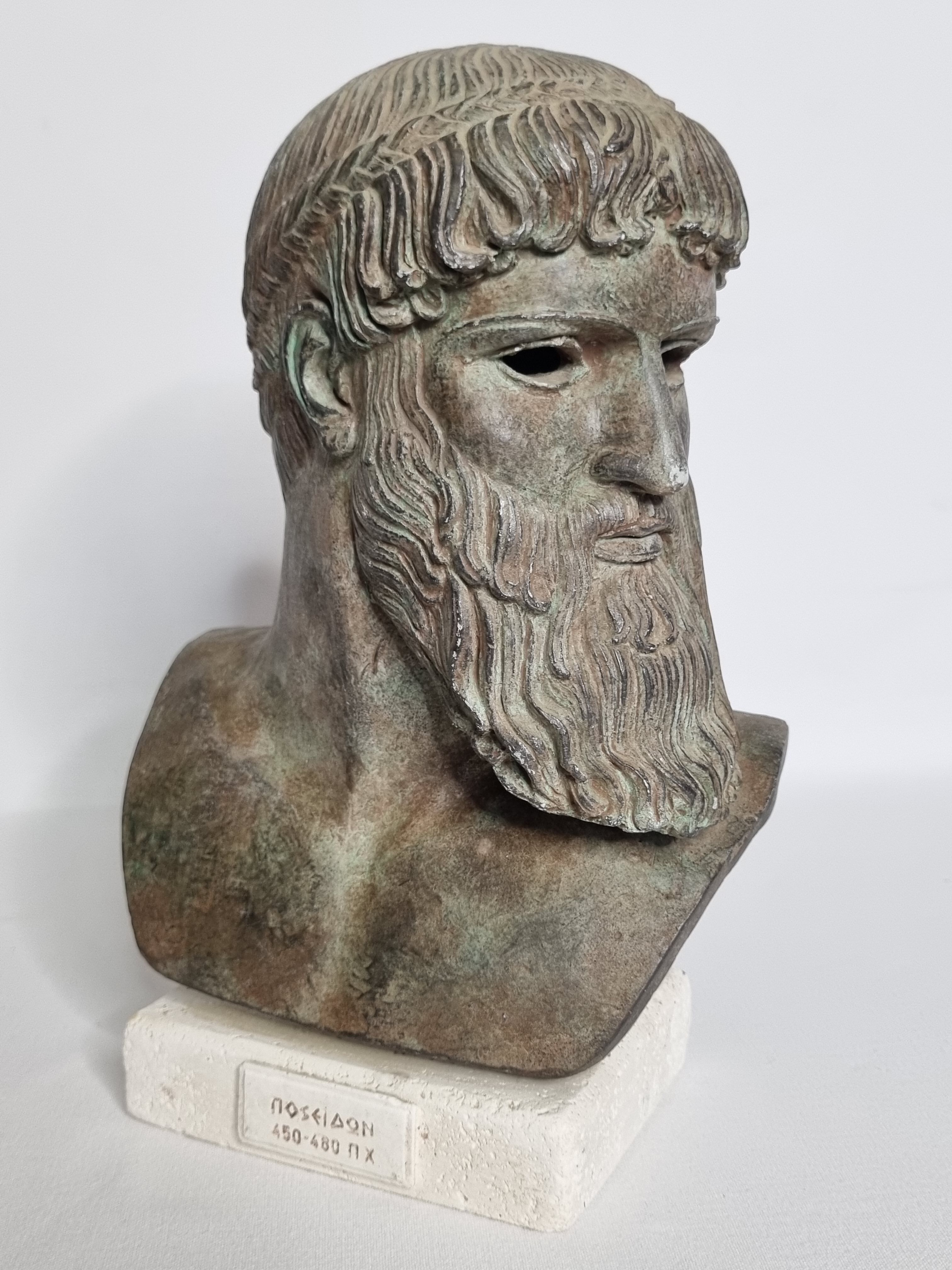 Bust of Poseidon in patinated plaster on plaster base,