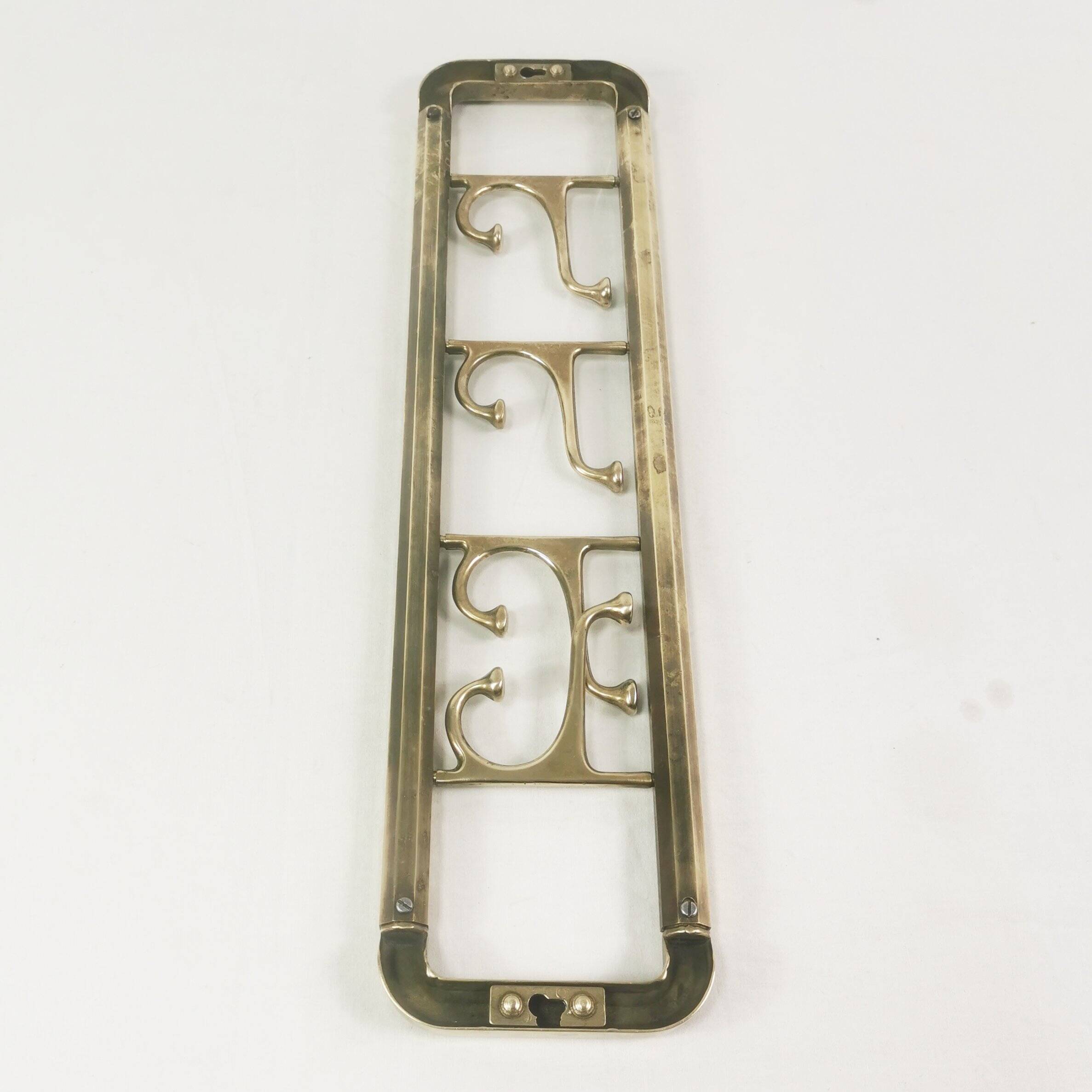 Art Deco brass wall hanger, Austria, 1940s.