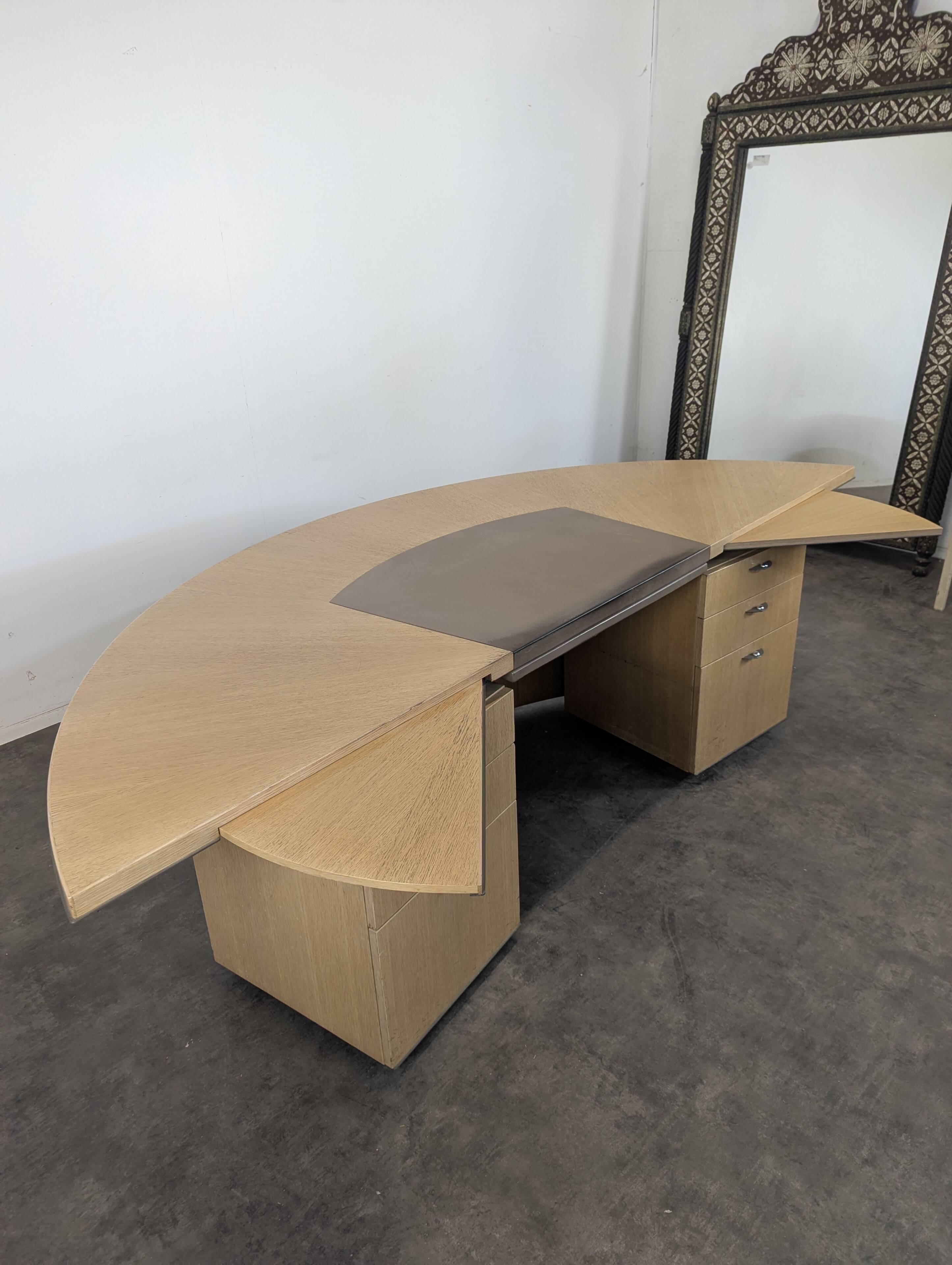 Large semicircular desk by André Putman published by Ecart International.