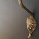 Set of 5 antique "Lion Head" coat hooks.