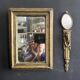 Miniature mirror from the 18th century in gilded wood, mercury glass.