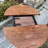 Extendable round dining table and 4 Baumann chairs.