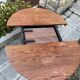 Extendable round dining table and 4 Baumann chairs.