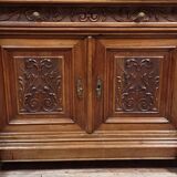Buffet with mirror in Renaissance style, entirely made of solid walnut.