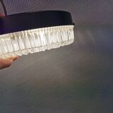 Ceiling light, in dark metallic paint with thick glass shade with beautiful details in the glass.