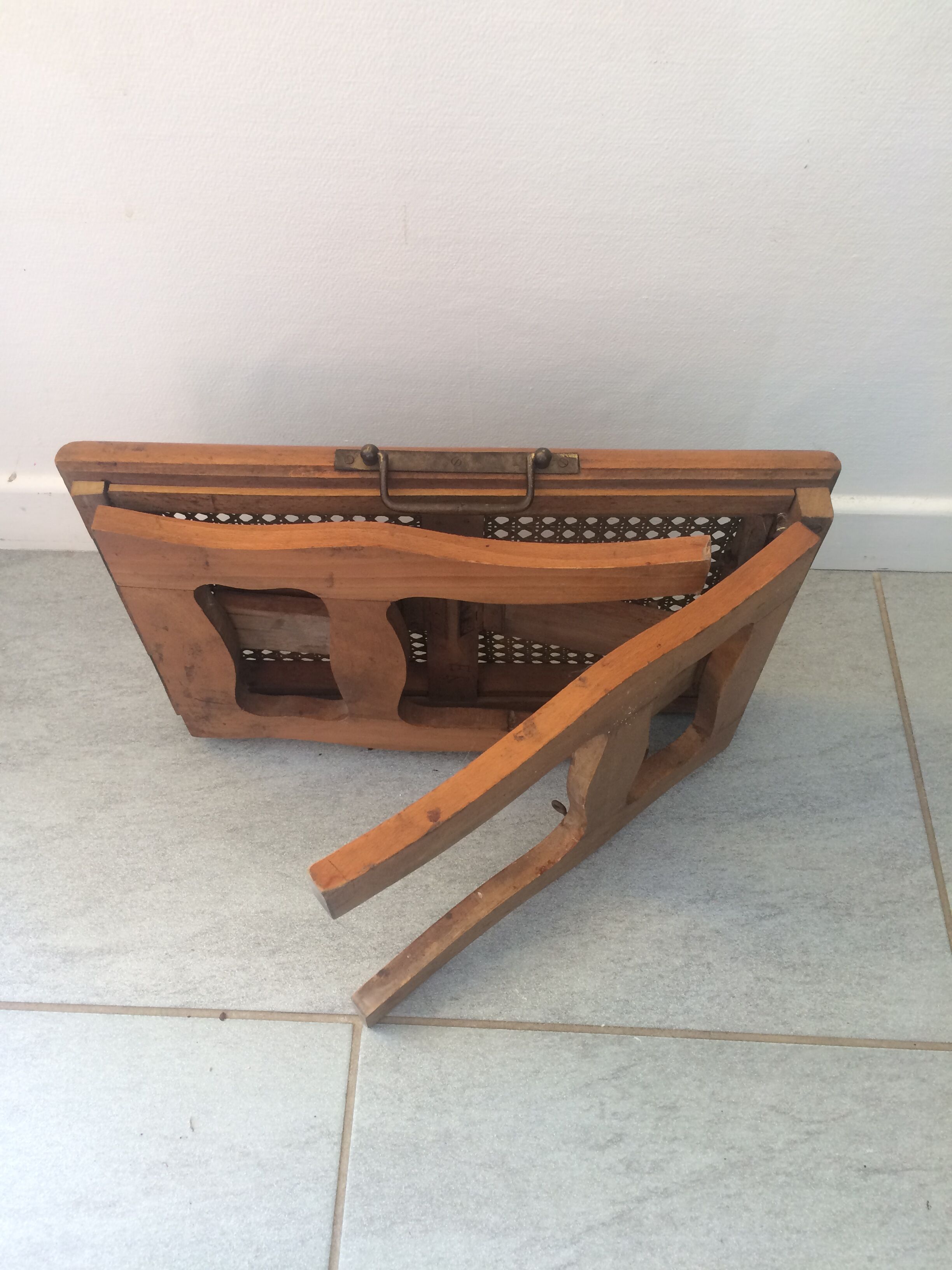 Folding stool in old caning