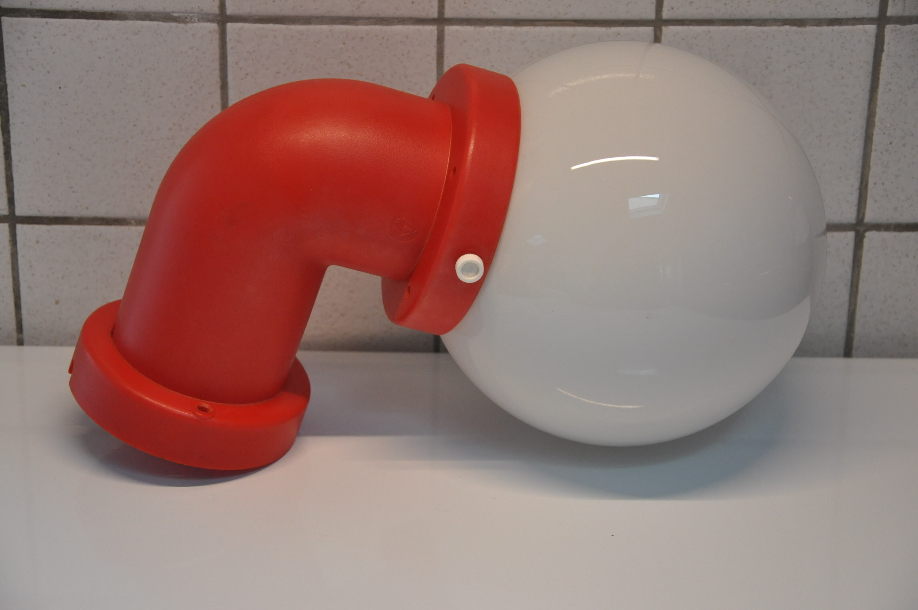 Danish wall light design indus red pipe