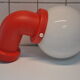 Danish wall light design indus red pipe