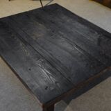 Brutalist coffee table in dark spruce with oak base