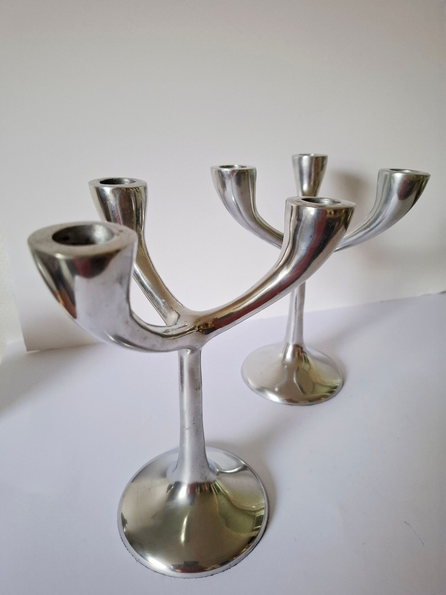 Vintage aluminium candlestick duo