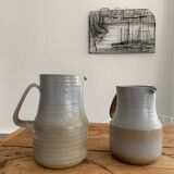 Pair vintage enamelled ceramic pitchers