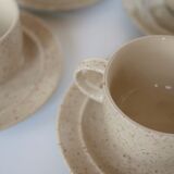 Coffee cup and vintage pyrity sandstone subcup
