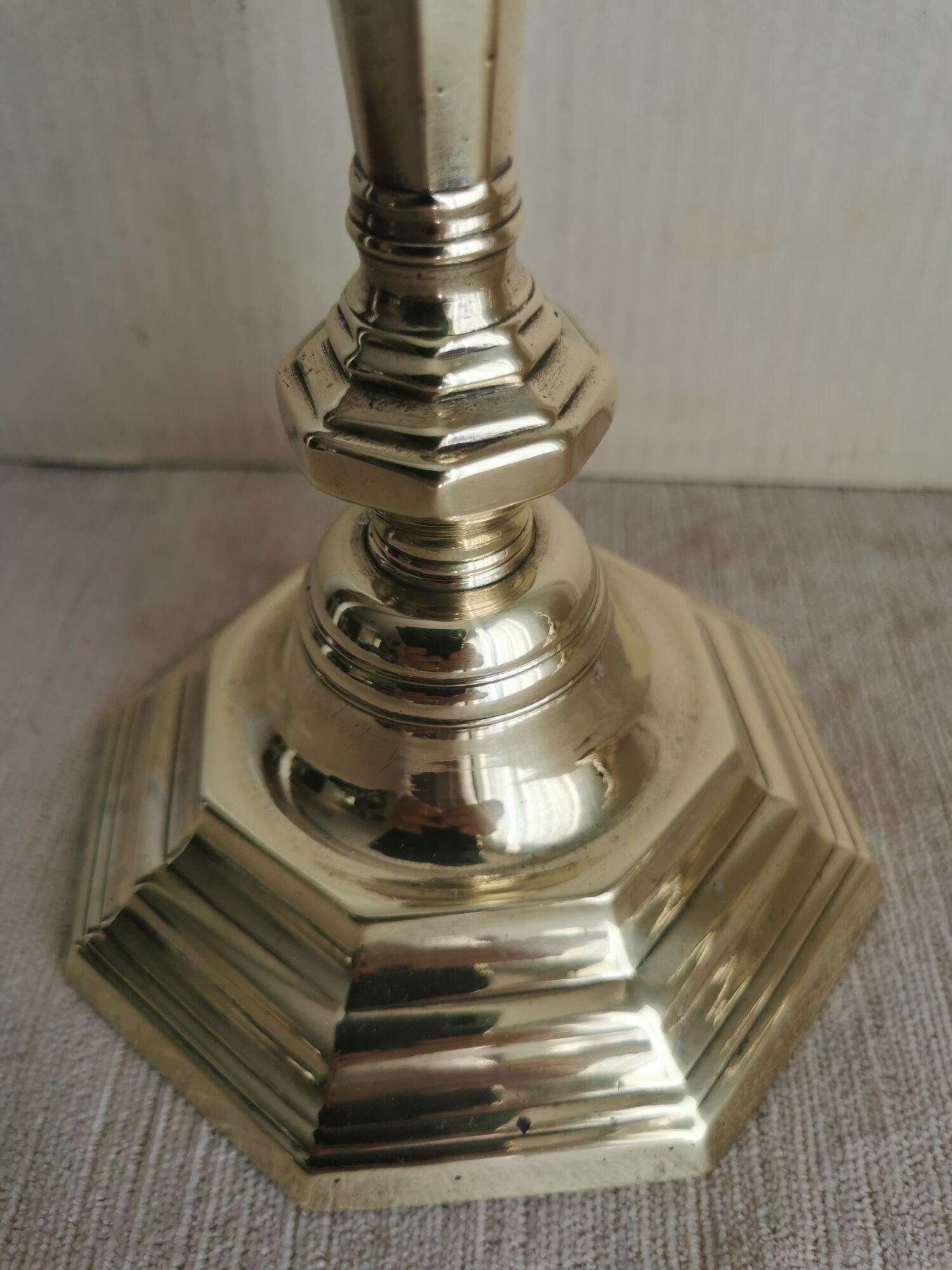 Pair of polished bronze candle holders XVIII th century