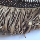 African mask with raffia and kaolin dots