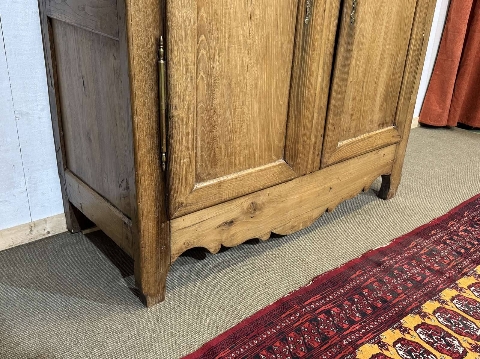19th-century country wardrobe in blonde chestnut.