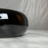 Ceramic ashtray of round shape of the 80s.