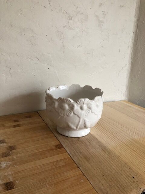 White ceramic pot cover
