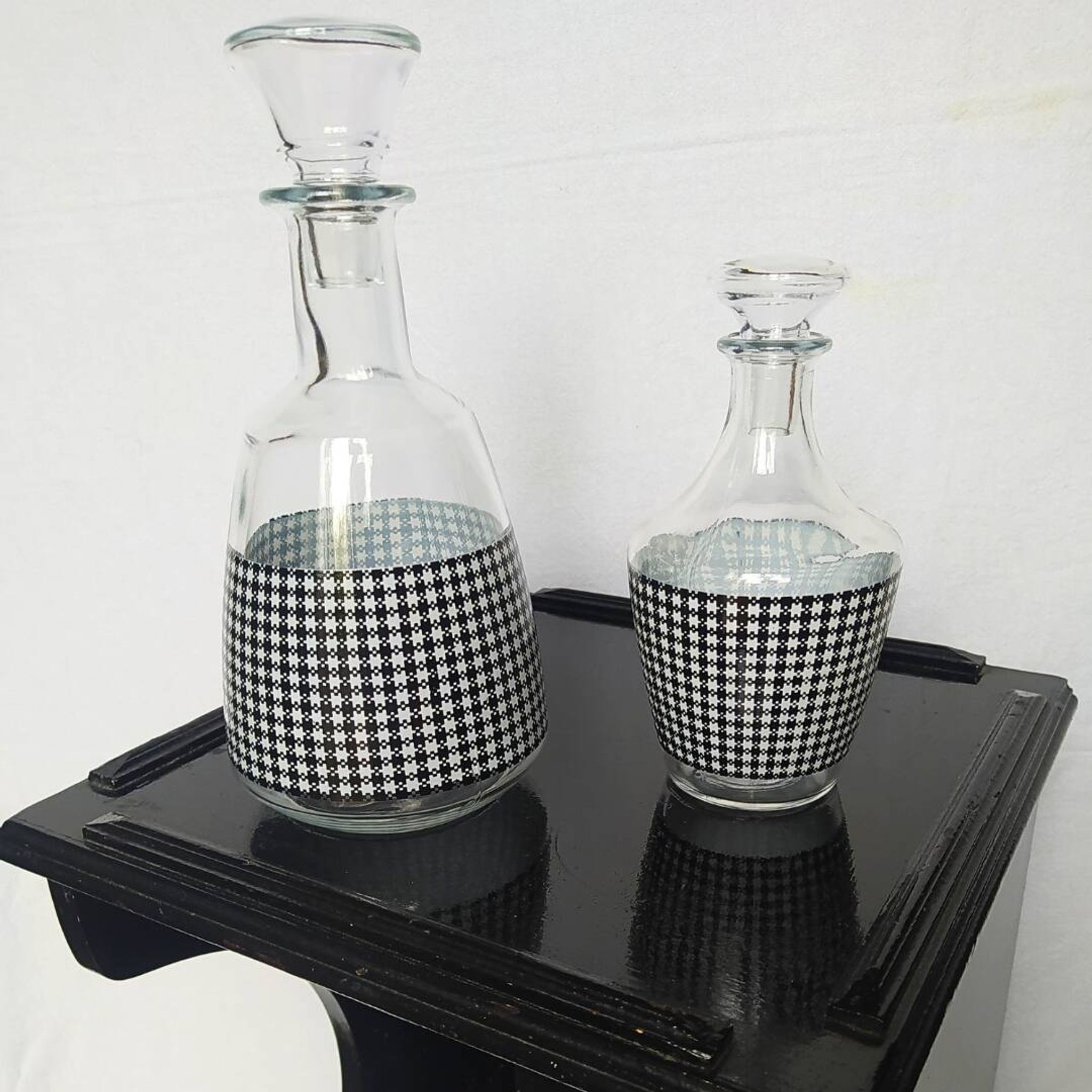 Set of 2 black and white houndstooth glass carafes from the Arques crystal factory. Rare.