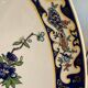 Grand plat à décor de Paons et fleurs XX siècle
