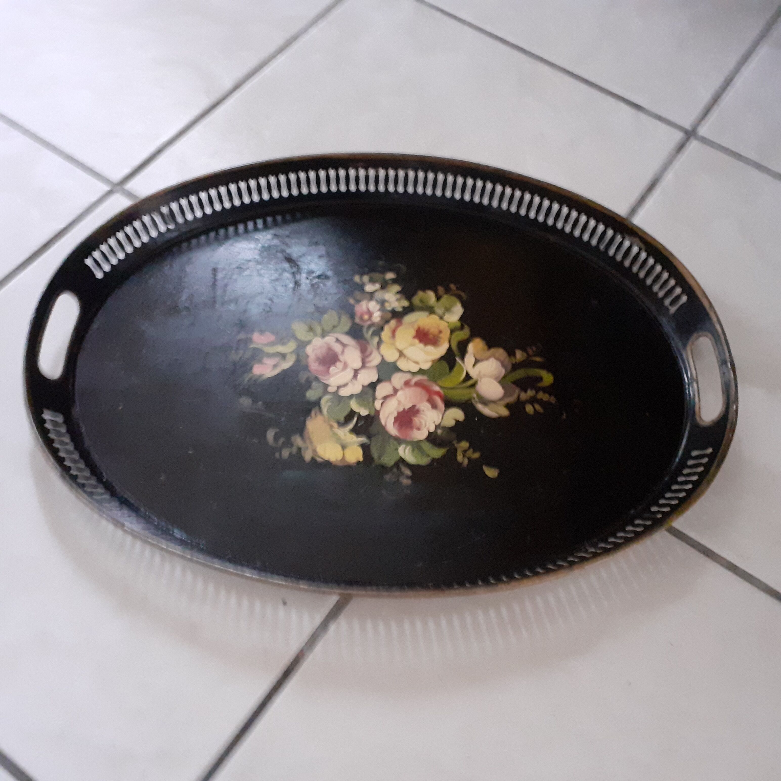 Old black oval top. Bouquet of roses. Hand painted.