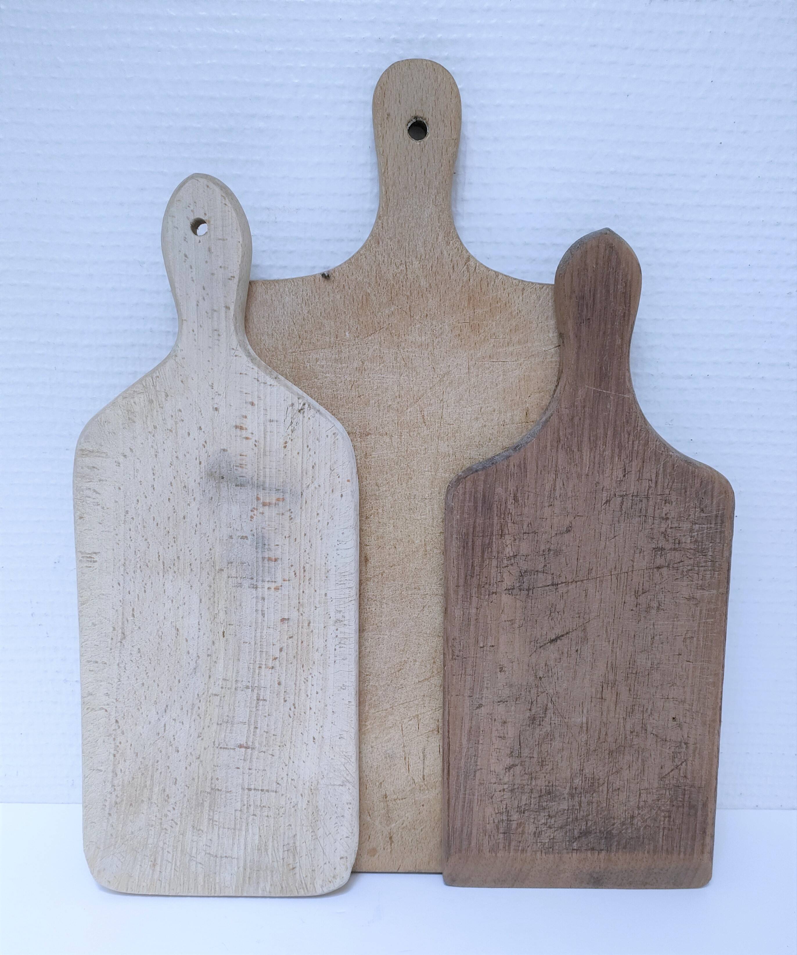Three vintage solid wood cutting boards