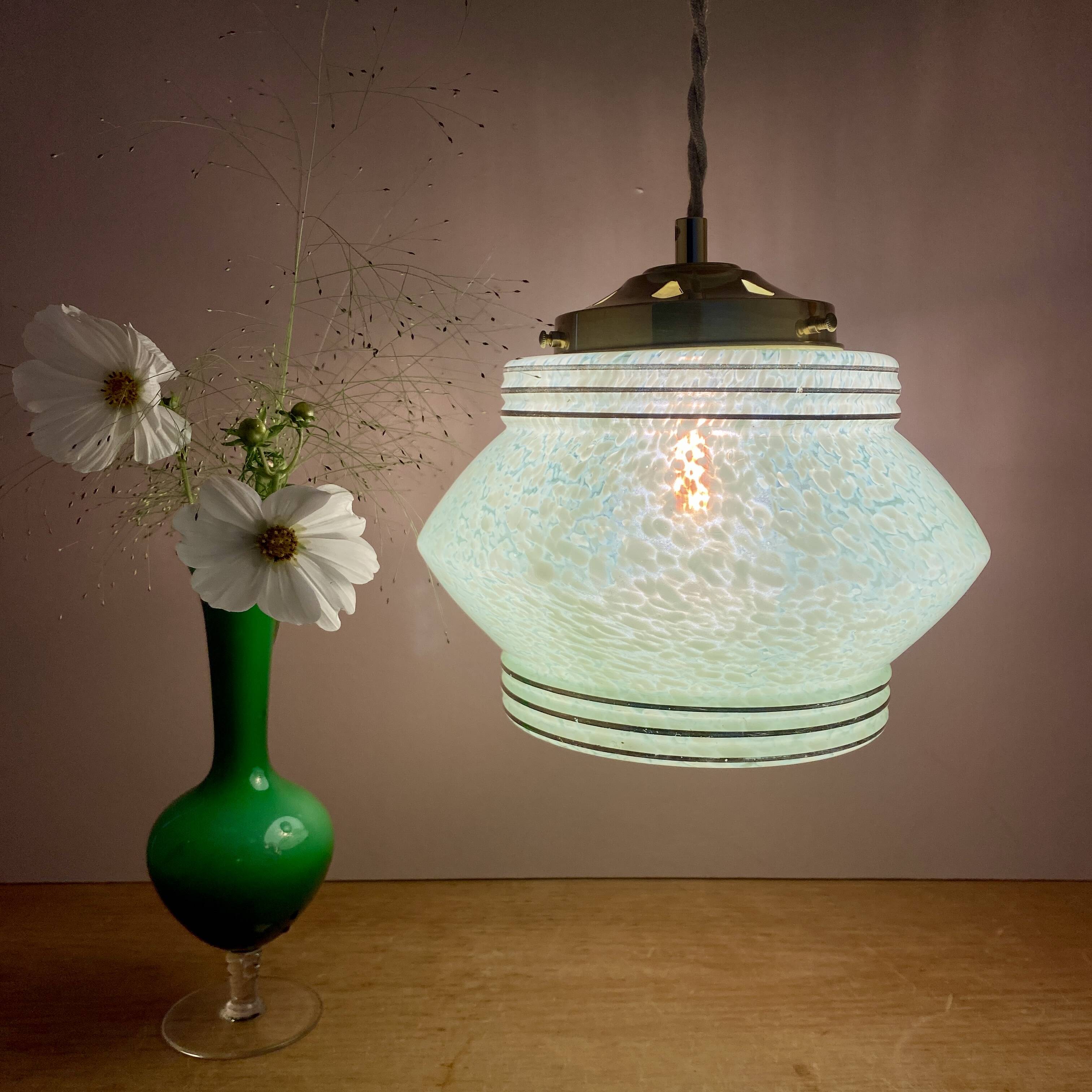 Art Deco globe pendant light in mint green and gold Clichy glass