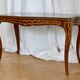 Antique coffee table with floral marquetry, Louis XV style.