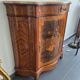 Curved support furniture in floral marquetry – Louis XV style, marble top, late 19th century.