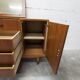 1960s teak sideboard with 4 drawers, 2 doors, and a mirror.