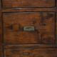Large vintage hardwood furniture in military country style.
