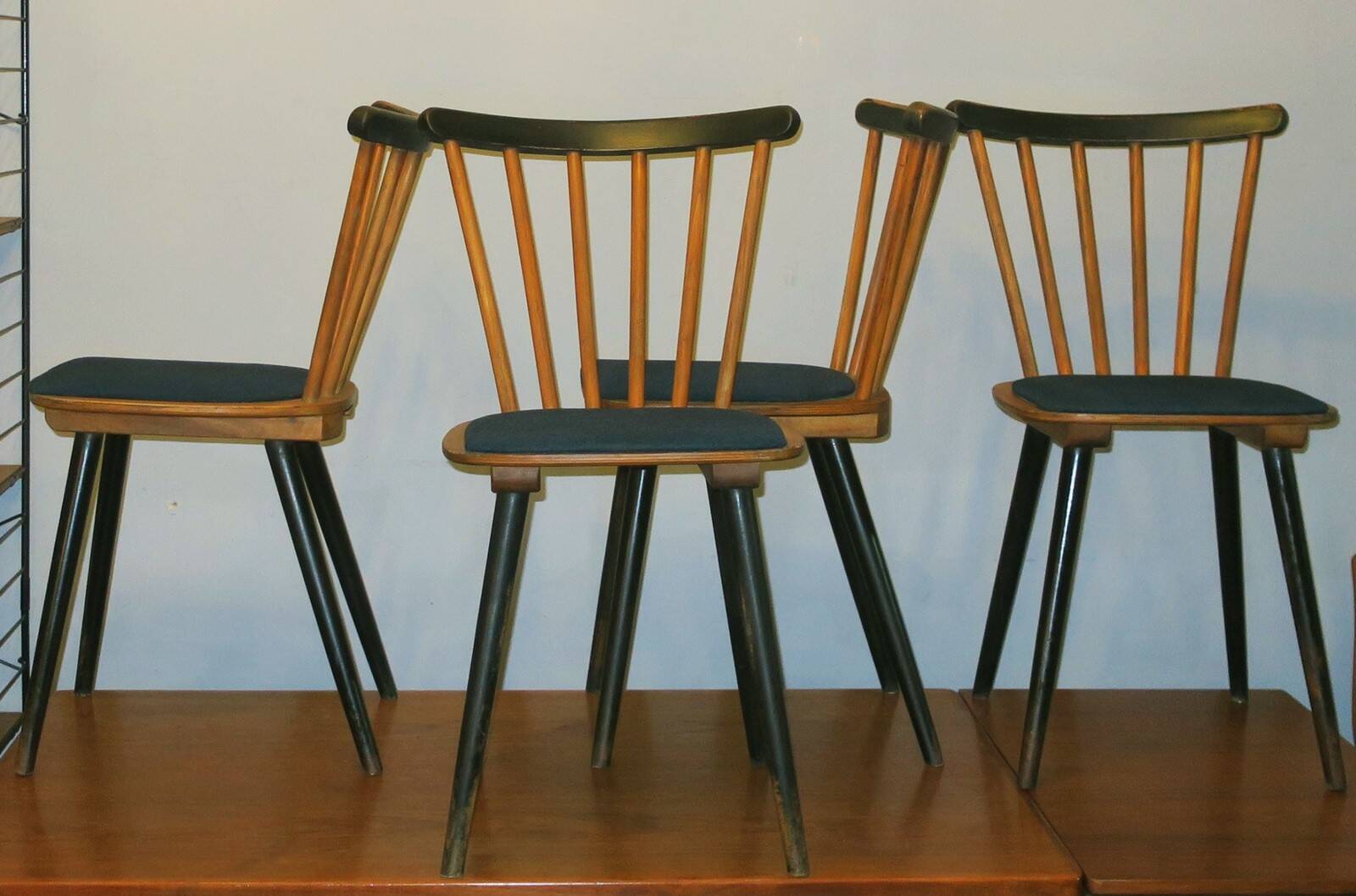 Set of 4 dining chairs with splayed legs and navy blue seat covers, 1960s