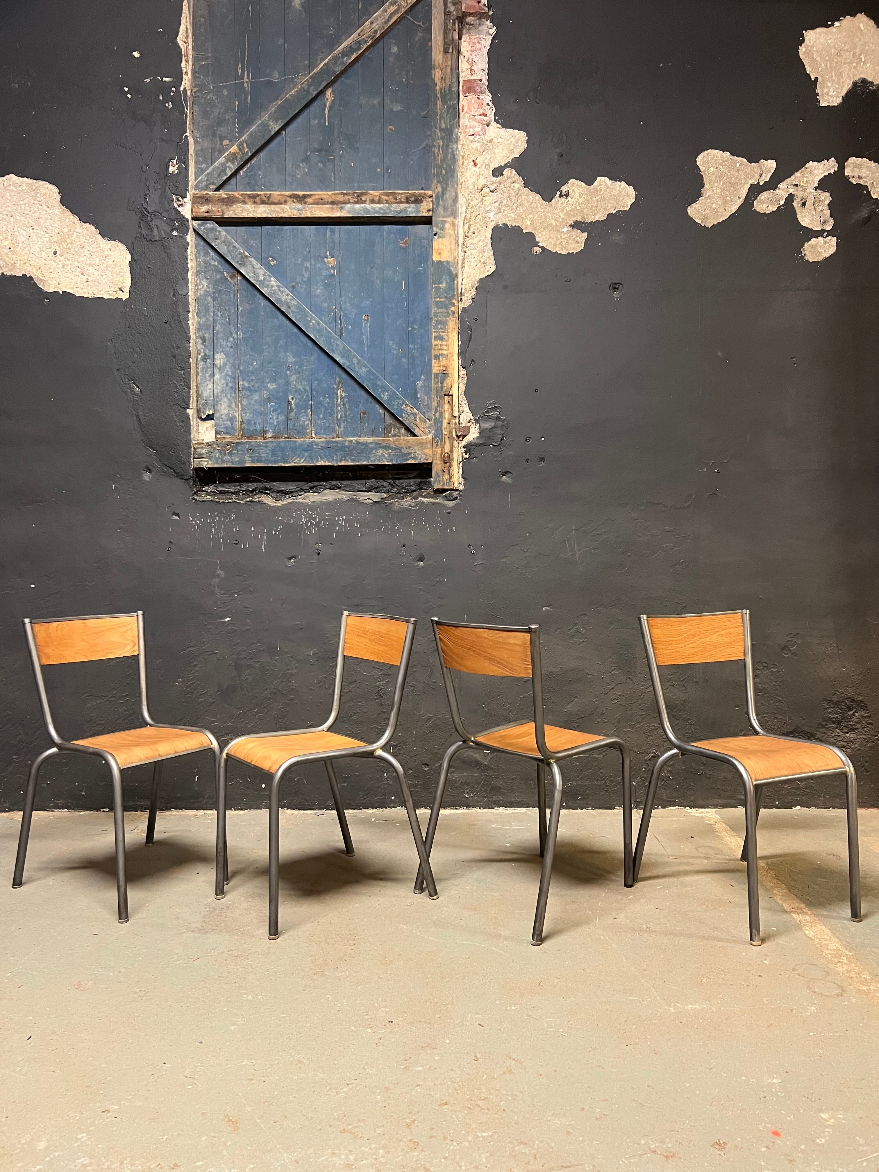 Set of Mulca school chairs patinated graphite.
