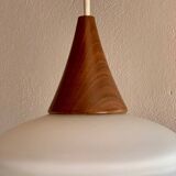 Scandinavian teak and opaline pendant light by Louis Kalff for Philips in 1968