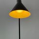 Black table lamp designed by Arne Jacobsen and manufactured by Louis Poulsen