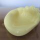 Empty hand-shaped pocket in pale yellow ceramic years70